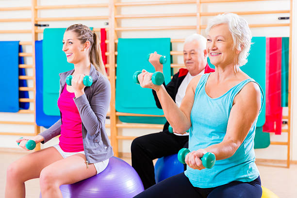 istock Group of people at physiotherapy 625237930