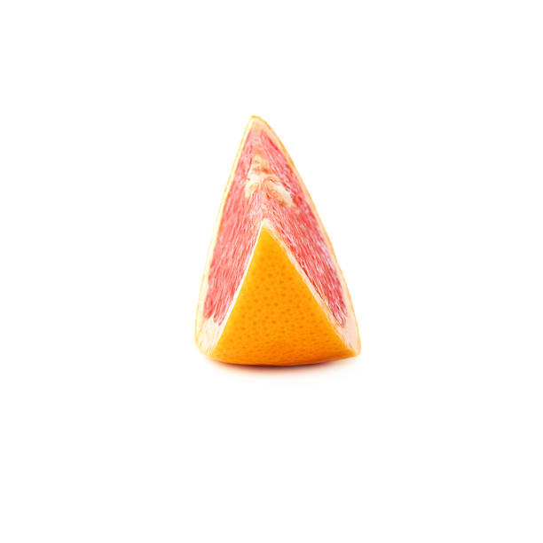 Slice section of grapefruit isolated over the white background