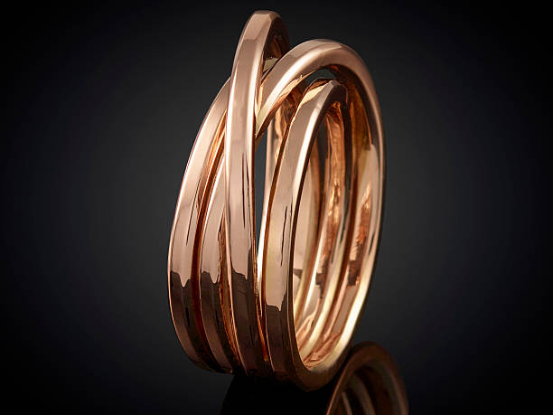 istock beautiful Golden ring isolated on black background 625241938