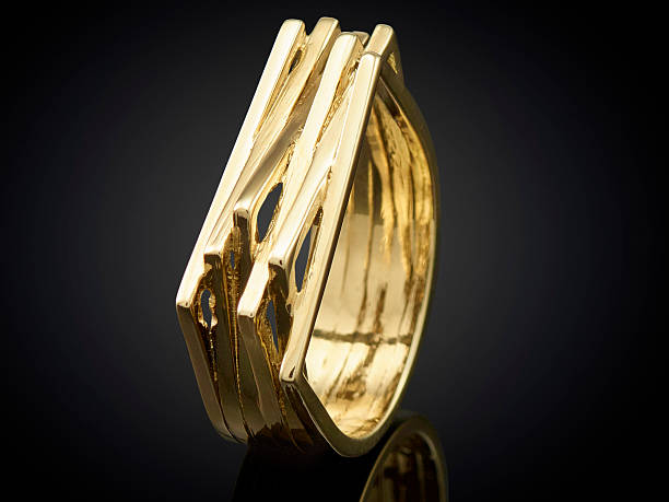 istock beautiful Golden ring isolated on black background 625241958