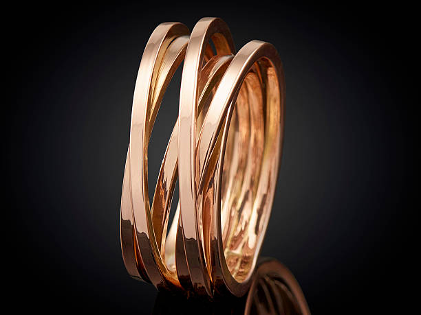 istock beautiful Golden ring isolated on black background 625241966