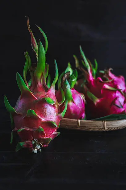 Dragonfruits on the dark background