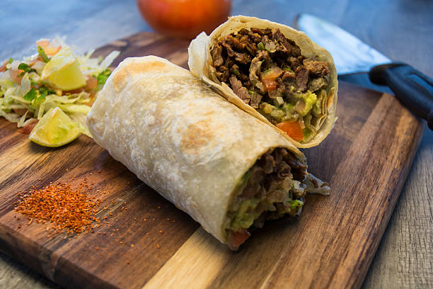 istock Mexican Burrito Meal With Lime And Red Pepper 625243380