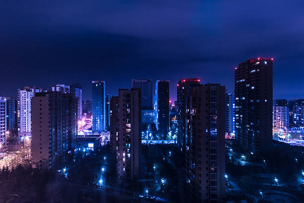 istock Qingdao city skyscrapers by night 625243694
