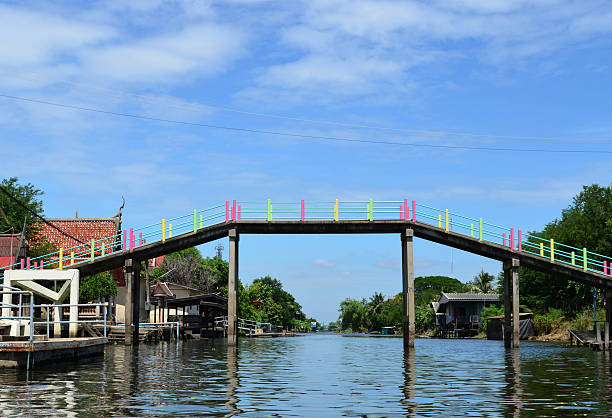 istock Colorful walkway concrete bridge over canal 625243828