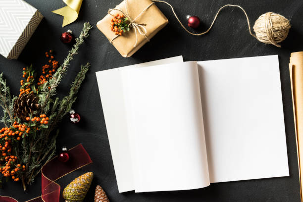 istock Open magazine with blank page in Christmas concept flat lay 625268428