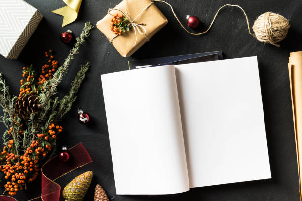 istock Open magazine with blank page in Christmas concept flat lay 625268834