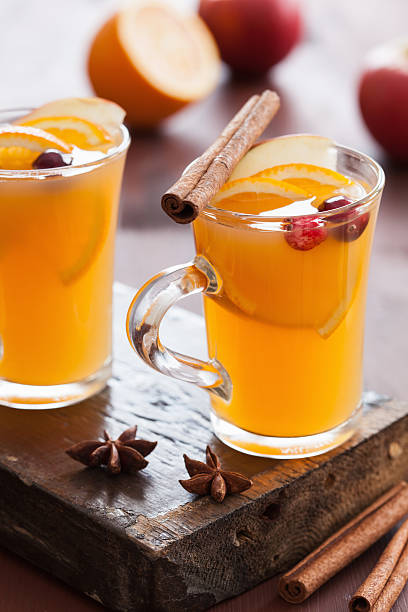 istock hot apple orange cider with cinnamon spice warming drink 625272778