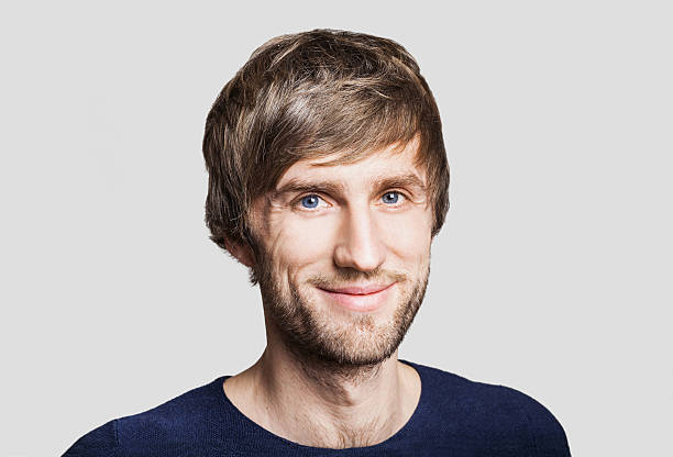 istock Cheerful smiling young man portrait 625279532