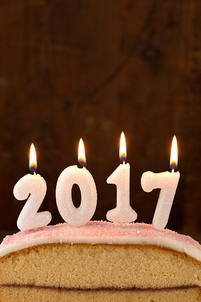 istock 2017 candles burning on top of a cake 625281068