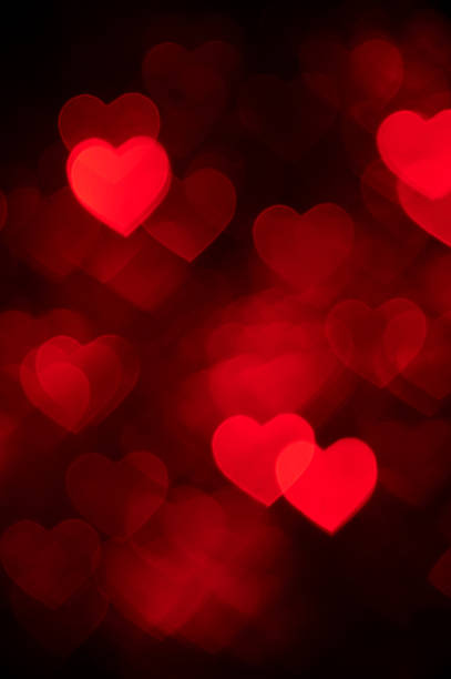 istock red heart bokeh background photo, abstract holiday backdrop 625281666