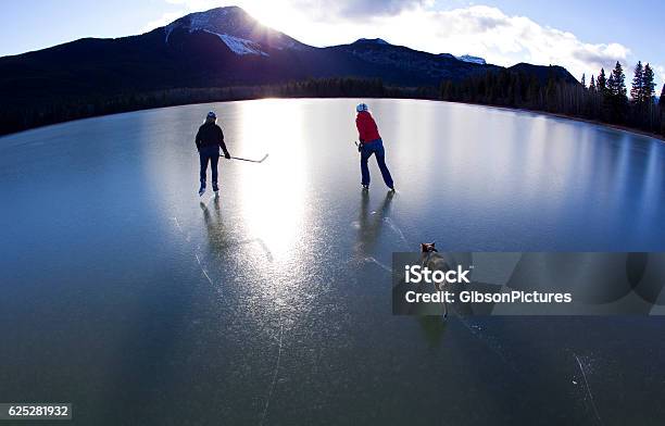 Canada Pond Ice Skating Stock Photo - Download Image Now - Canada, Ice-skating, Winter