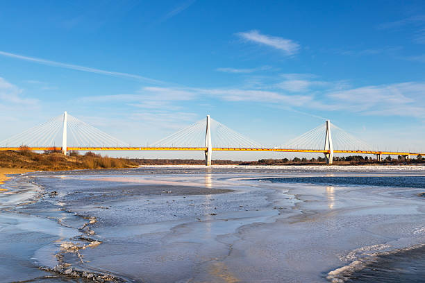 istock modern bridge over the frozen river 625282852