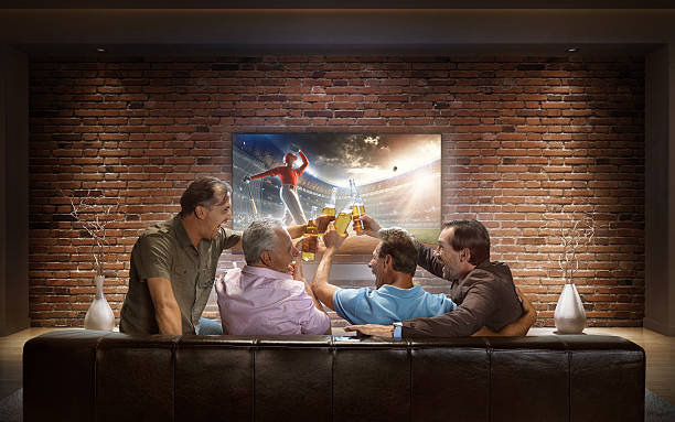 istock Adults watching Baseball game at home 625283910