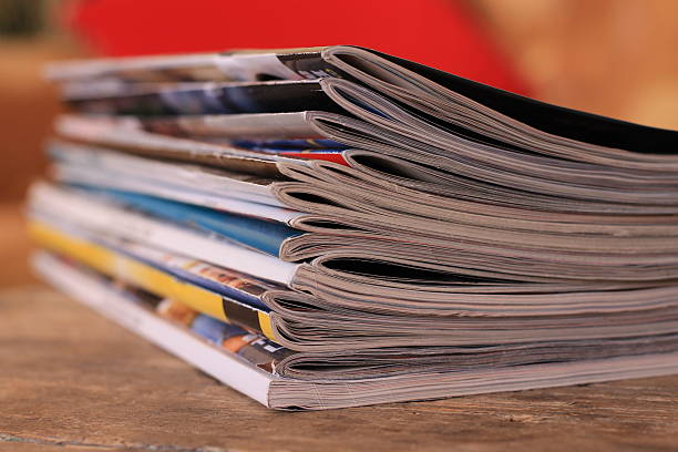 istock Magazines on the wooden table 625300578