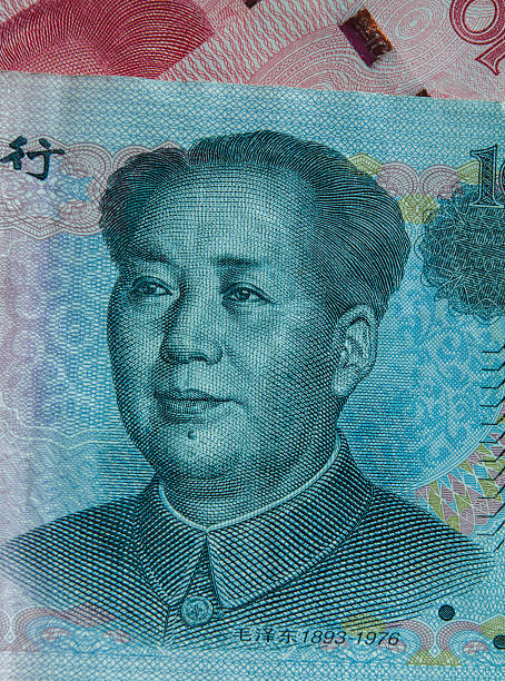 портрет мао цзэдуна в китайской банкноте в юанях - mao tse tung стоковые фото и изображения