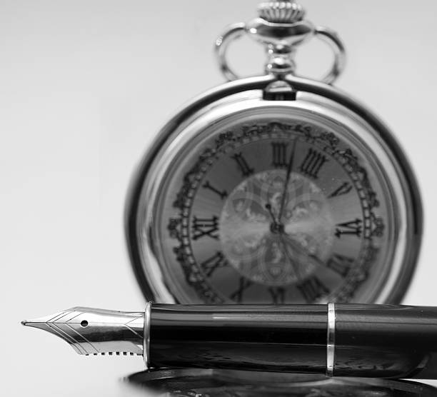 istock Pen and pocket watch 625301972