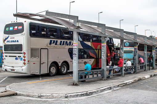 Osasco, Brazil, November 23, 2016. Bus and passenger movement in the embarkation and disembarkation platform of the Alfredo Tomaz Bus Station in the municipality of Osasco, SP.