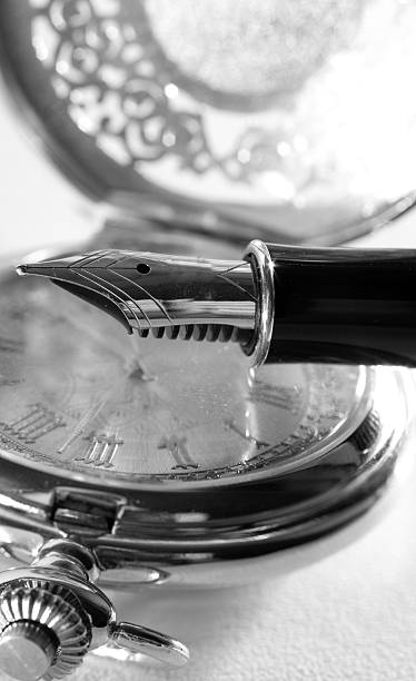 istock Pen and pocket watch 625305070