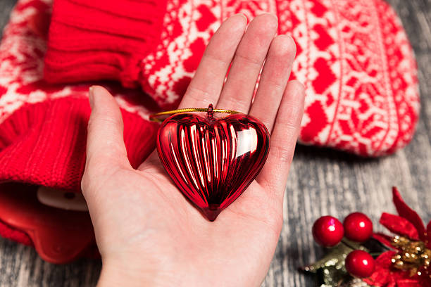 istock Christmas tree decoration in hand 625305446