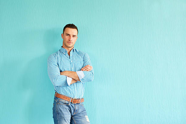 istock Young man with crossed arms 625305980