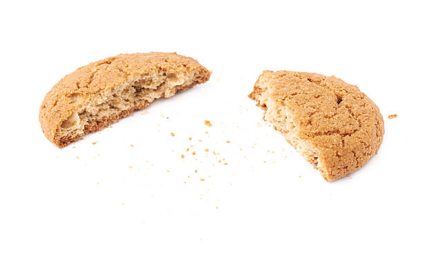 istock Broken into pieces cookie isolated over the white background 625308914