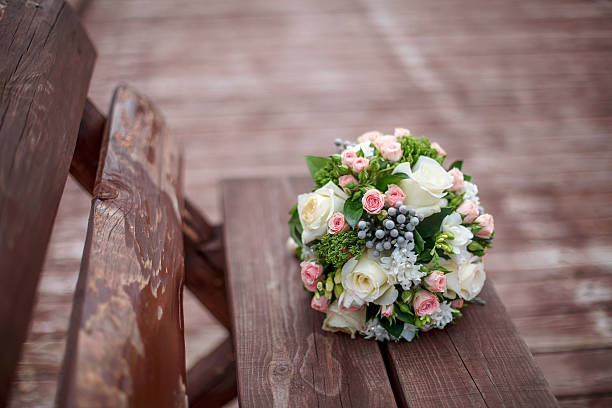 istock Beautiful wedding bouquet on wooden background 625310734