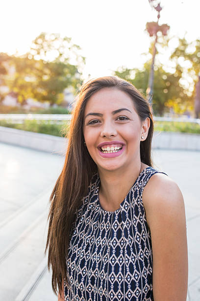 istock Young happy woman at the park. 625312948
