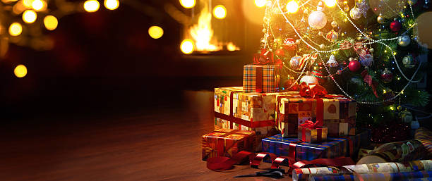 istock Beautiful decorated Christmas tree; holidays present boxes and f 625313204