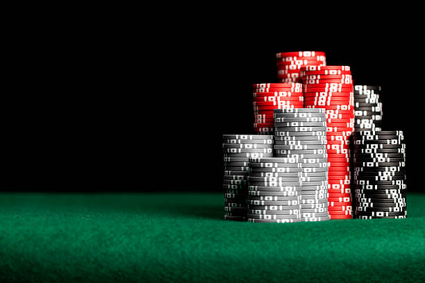 Stacks of poker chips on table Stacks of poker chips on a green felted poker table. texas hold em photos stock pictures, royalty-free photos & images