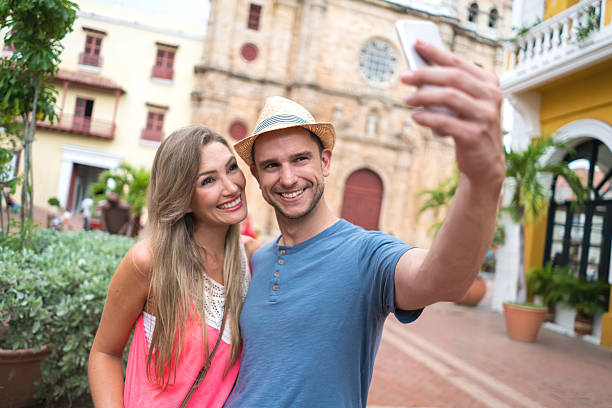 istock Tourists taking a selfie while traveling 625328012