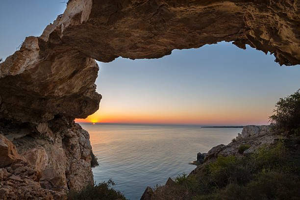 istock Magical view. Stone natural bridge during sunrise 625331188