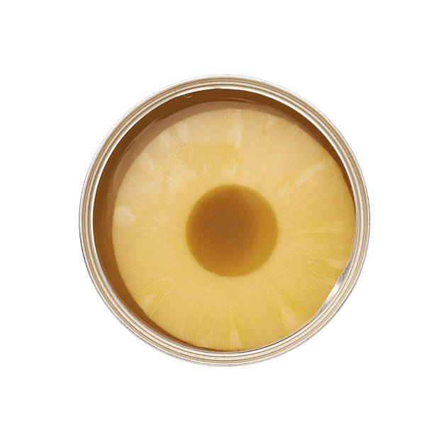 istock Canned pineapple isolated over white background 625332744