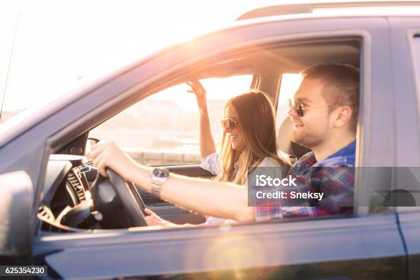 Couple Driving In Car Stock Photo - Download Image Now - Driving, Car, Happiness