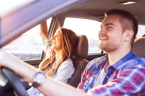 istock Couple driving in car 625354770