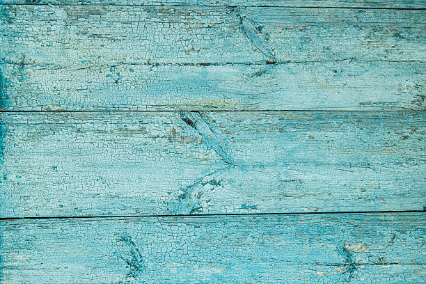 istock Old weathered wood plank painted in blue. 625356332
