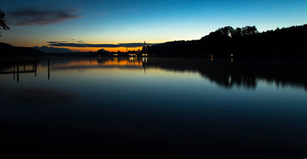 istock silhouette on the werbellinsee at dawn light 625359954