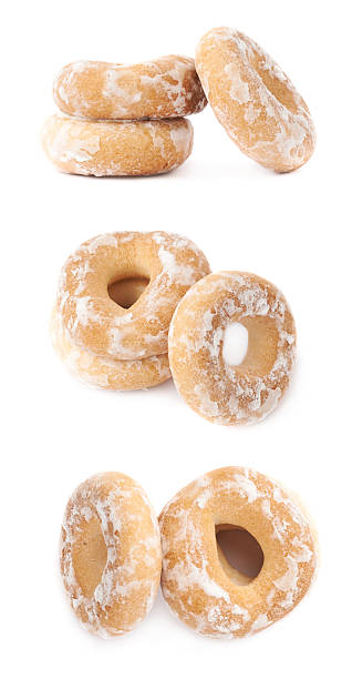 istock Stack of small cakes with hole isolated over the white 625370922