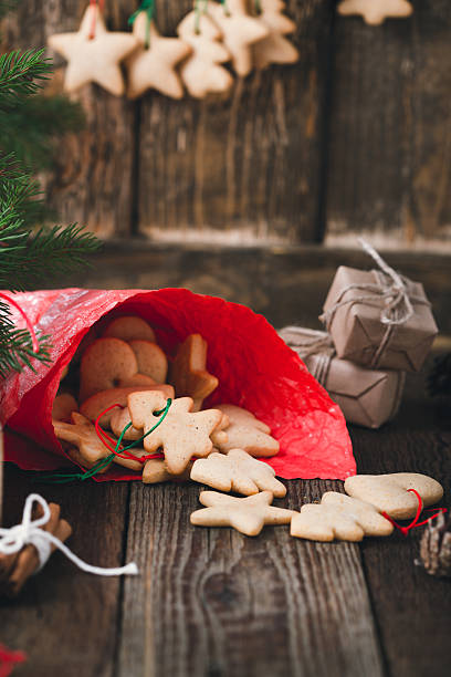 istock Homemade xmas cookies on rustic table. Preparations for holiday 625371244