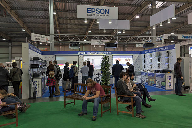 Kiev, Ukraine - October 9, 2016: People visit Epson, Japanese electronics company, one of world largest manufacturers of computer printers booth at CEE 2016.