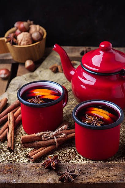 istock Hot mulled wine in a red mug for winter holidays 625371698