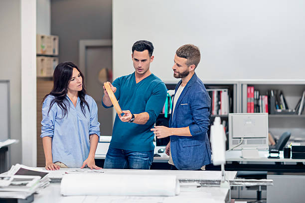 istock Business people discussing over new project in office 625371702