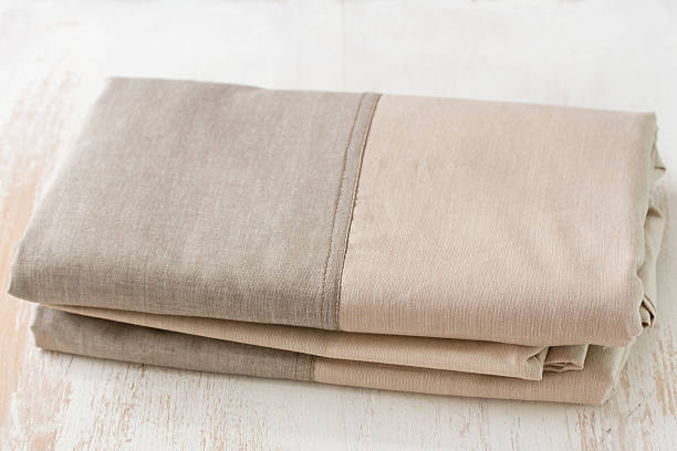 istock textile on white wooden background 625371772