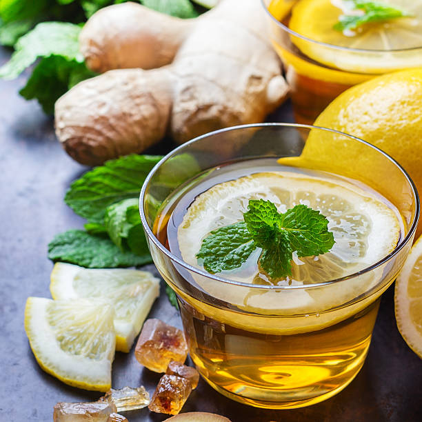 istock Ginger tea in a glass for flu cold winter days 625373372