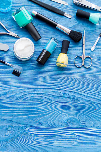 istock set for manicure and make-up on wooden background 625376314
