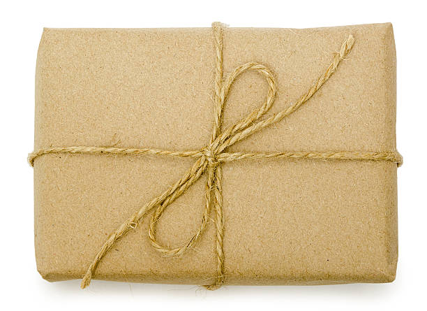 istock gift wrapping from Kraft paper wrapped with twine 625383080