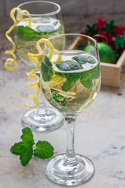 istock Spritzer cocktail with white wine, mint and ice, vertical 625384544