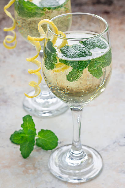 istock Spritzer cocktail with white wine, mint and ice,  vertical 625384568
