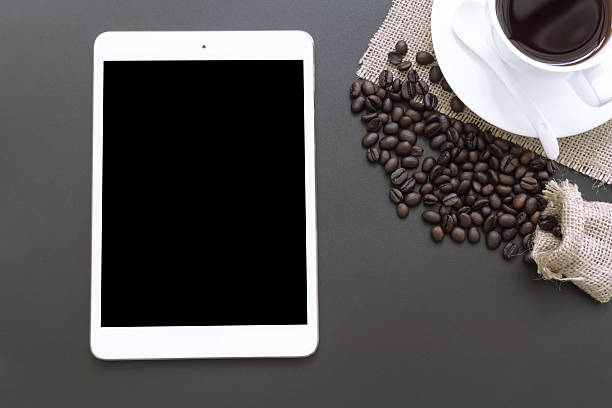 istock Smartphones and coffee cup. top view. 625385650
