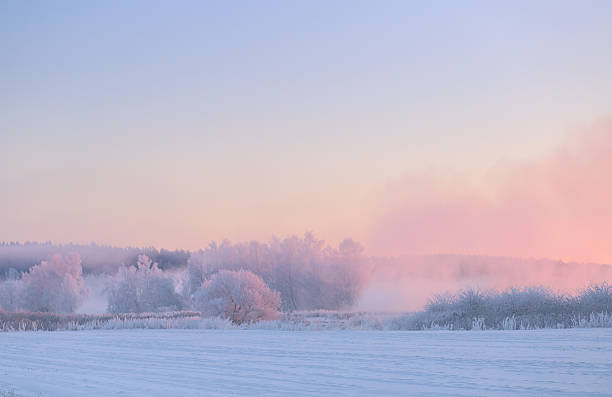 istock Color christmas sky above snowy field 625385784